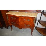 A marquetry inlaid and ormolu mounted marble top 2 drawer 'bombe' chest.