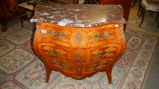 A kingswood 3 drawer bombe front chest with marble top.