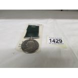A Victorian volunteer long service medal, 2813 S E Jt A Emmett, 3rd VB Manchester regiment.