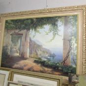 A large framed oil over print view of Amalfi coast signed C F Aagard, 100 x 68.5 cm.