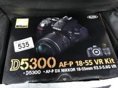 A boxed Nikon D5300 camera with case (in as new perfect condition)