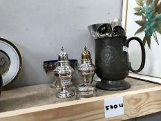 A mixed lot of metalware mostly white metal cups,