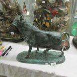 A bronze bull being a copy of the original by Antoine Louis Barye.