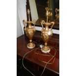 A pair of urn shaped table lamps.