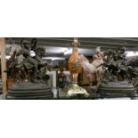 A pair of 19th century (possibly bronze) knights on horseback.