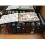 10 folders of cigarette cards, 30 postcards etc.