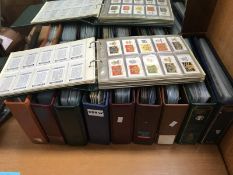 10 folders of cigarette cards, 30 postcards etc.