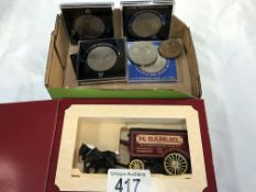 A small quantity of commemorative coins & a collectors van