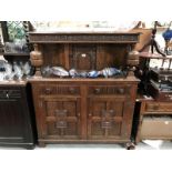 A carved wood buffet