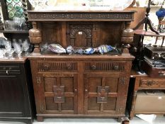 A carved wood buffet