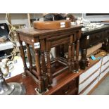 A small oak set of nesting tables