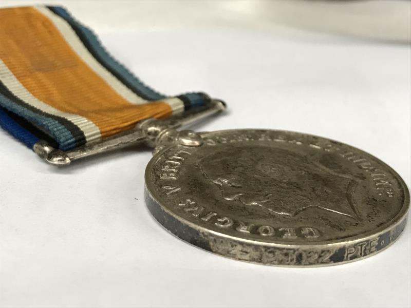 A quantity of medals with ribbons and a pair of military binoculars. - Image 3 of 10