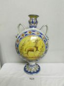 A large 2 handled flask shaped vase hand painted with animals, (possibly Delft).
