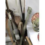 An assortment of split cane and bamboo fishing rods including spares and repairs