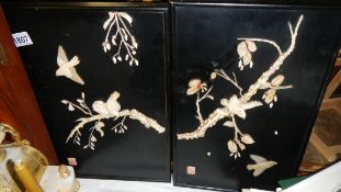 A pair of early Chinese panels with applied ivory birds,