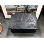 An old copper slipper box,