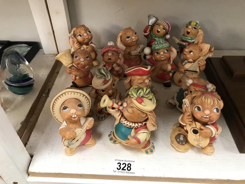 A collection of 12 Pendelfin figurines