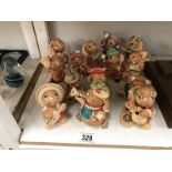A collection of 12 Pendelfin figurines