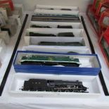 10 '00' gauge locomotives and tenders.