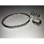 A silver/apatite bracelet and ring.