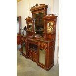 A mahogany mirror back sideboard with mirrors to doors.