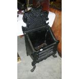 A cast iron fire grate.