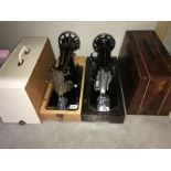 2 decorative Singer sewing machines in modern cases