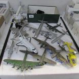 A quantity of unboxed die cast and plastic aircraft.