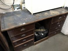 A kneehole work bench with small vice (tools & fixings in drawers)