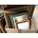 A box of framed and glazed pictures