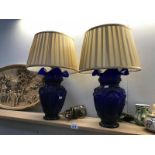 A pair of blue glass vase table lamps