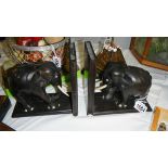 A pair of elephant bookends.