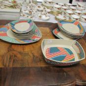 13 pieces of Rosenthal studio line Dorothy Hafner design dinner ware including plates and tureen.