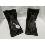 A pair of bronze rabbit bookends,.