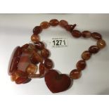 A Lola Rose carnelian necklace and bracelet.