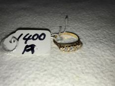 An 18ct 5 stone diamond ring, size M.