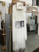 A vintage size 12 wedding dress with veil