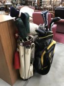 A golf bag with set of clubs (John Letters) and 1 bag with golf clubs