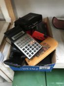 A quantity of calculators & mobile phones etc.