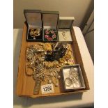A mixed lot of costume jewellery including Lalique cross and Christian Dior magnifying pendant.