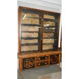 A large bamboo and lacquered book case.