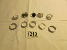 A quantity of rings including some silver.