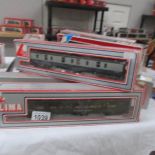 12 boxed Lima carriages.