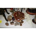 A large amethyst and other stone and crystal objects.