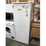 A Beko tall fridge