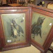 A pair of oak framed and glazed Victorian embossed card bird study.