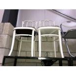 A pair of white painted Bentwood chairs