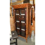 A bamboo 2 door cabinet.