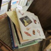 A good lot of books relating to collectables, cigarette cards etc.