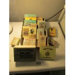 A collection of vintage cigarette and match boxes,